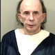 Illustration for article titled Phil Spectors Mug Shot Is Scary As Hell
